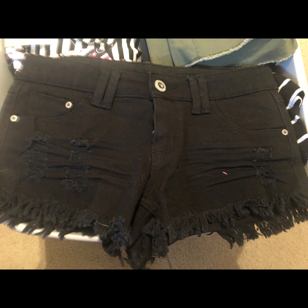 Black, distressed super shorty shorts